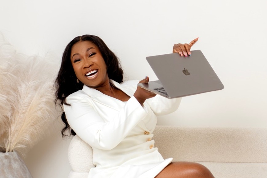Bisola WhizQueen with laptop